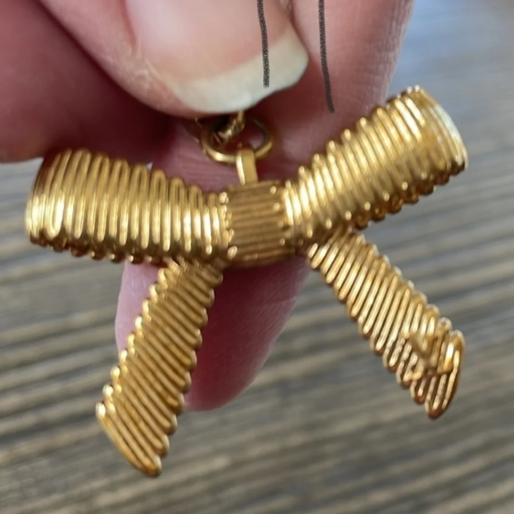 Louis Vuitton Leather Tassel Bag Charm Key Ring with Bow Charm